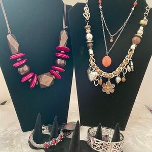 Paparazzi “Charmed I’m sure” necklace set. 3 necklaces, 3 earring and 2 bracelet